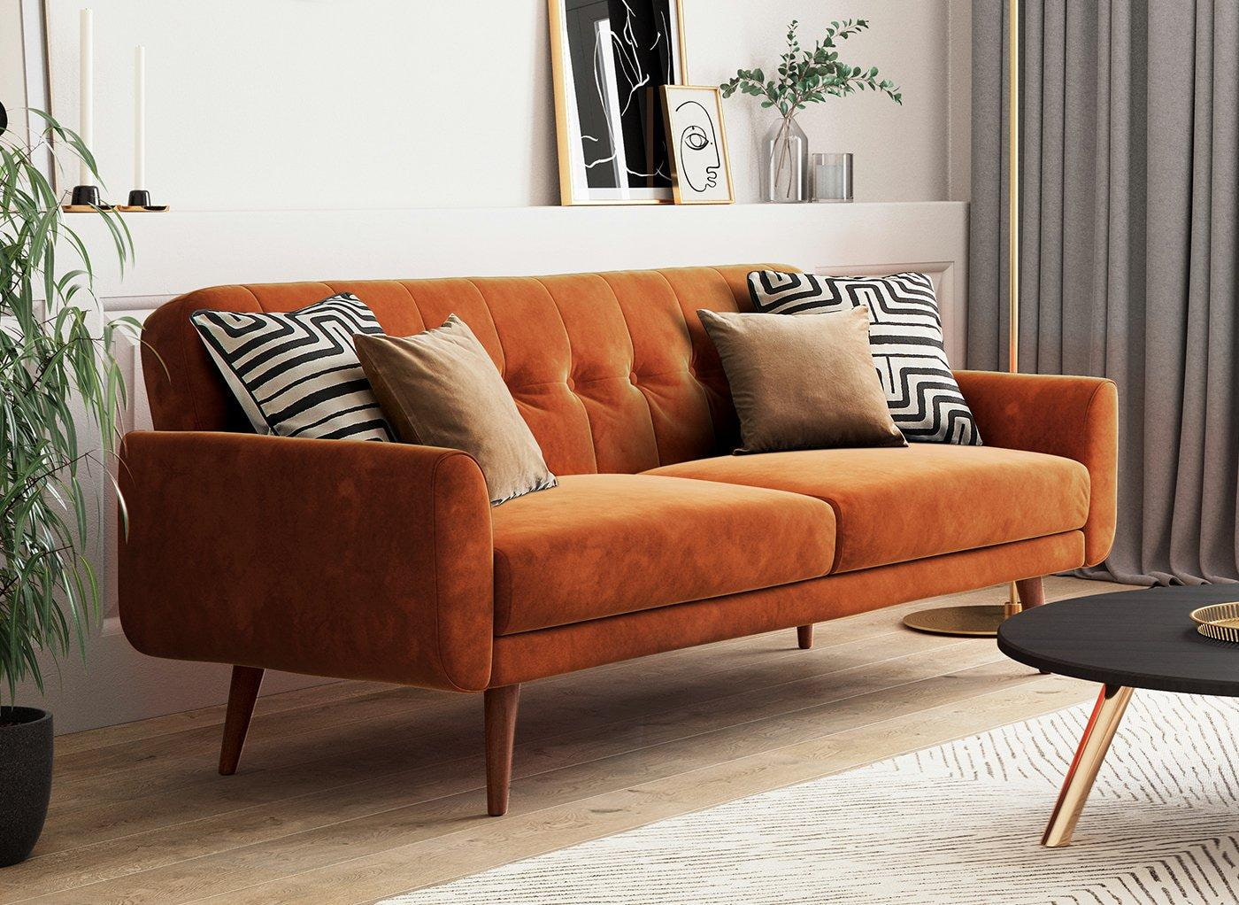 Terracotta sofa anchoring a warm living room